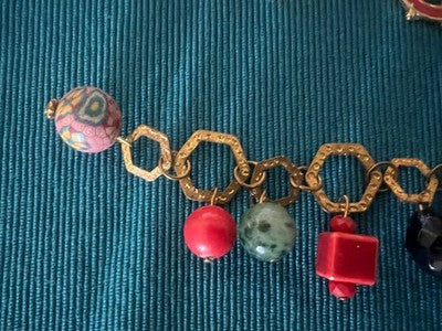 Red Costume Jewelry Bracelets With Vintage Charms And Pendants N.6