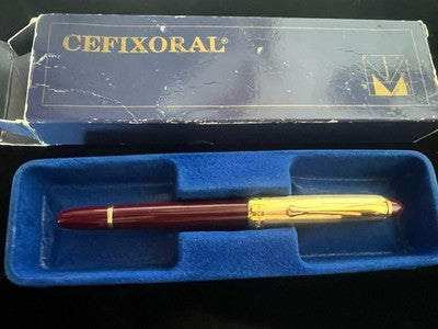 🔴 Penna roller CEFIXORAL bordò cappuccio dorato scrive con astuccio