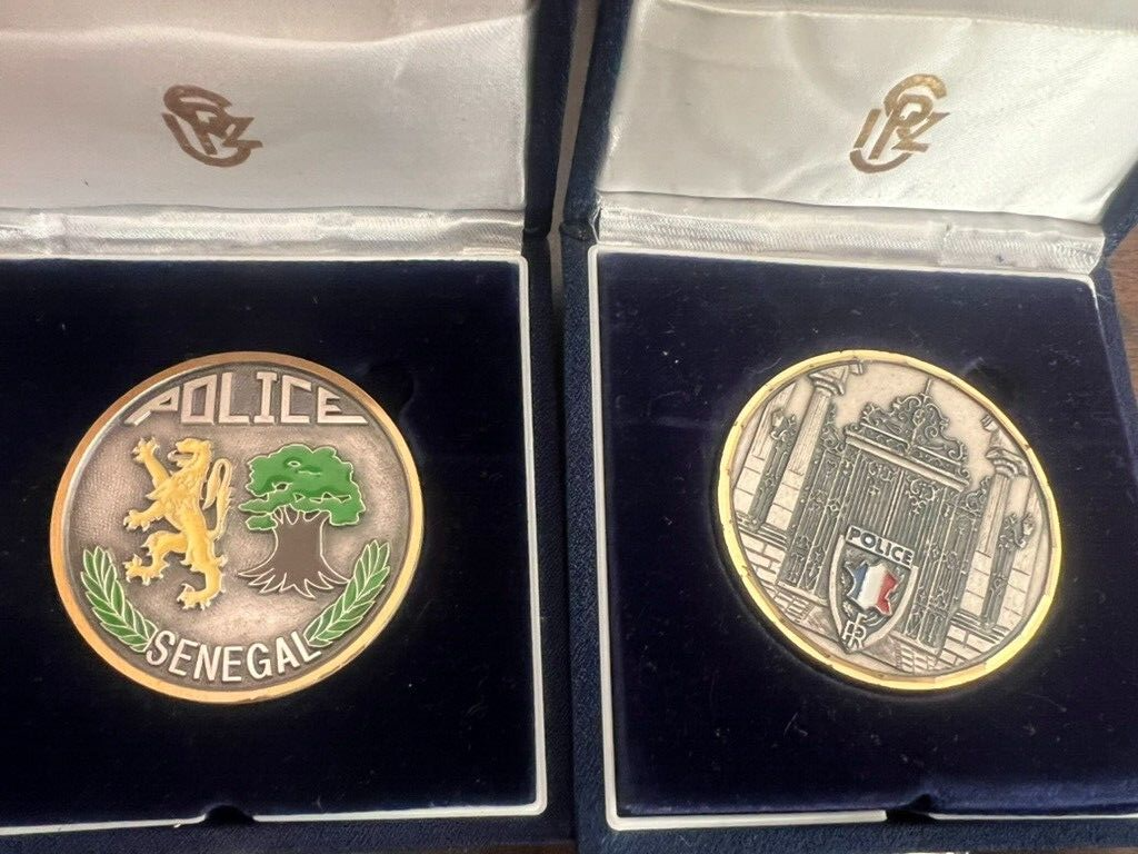 Medals Police International And Cardboard Marble IN Cases Stock 2