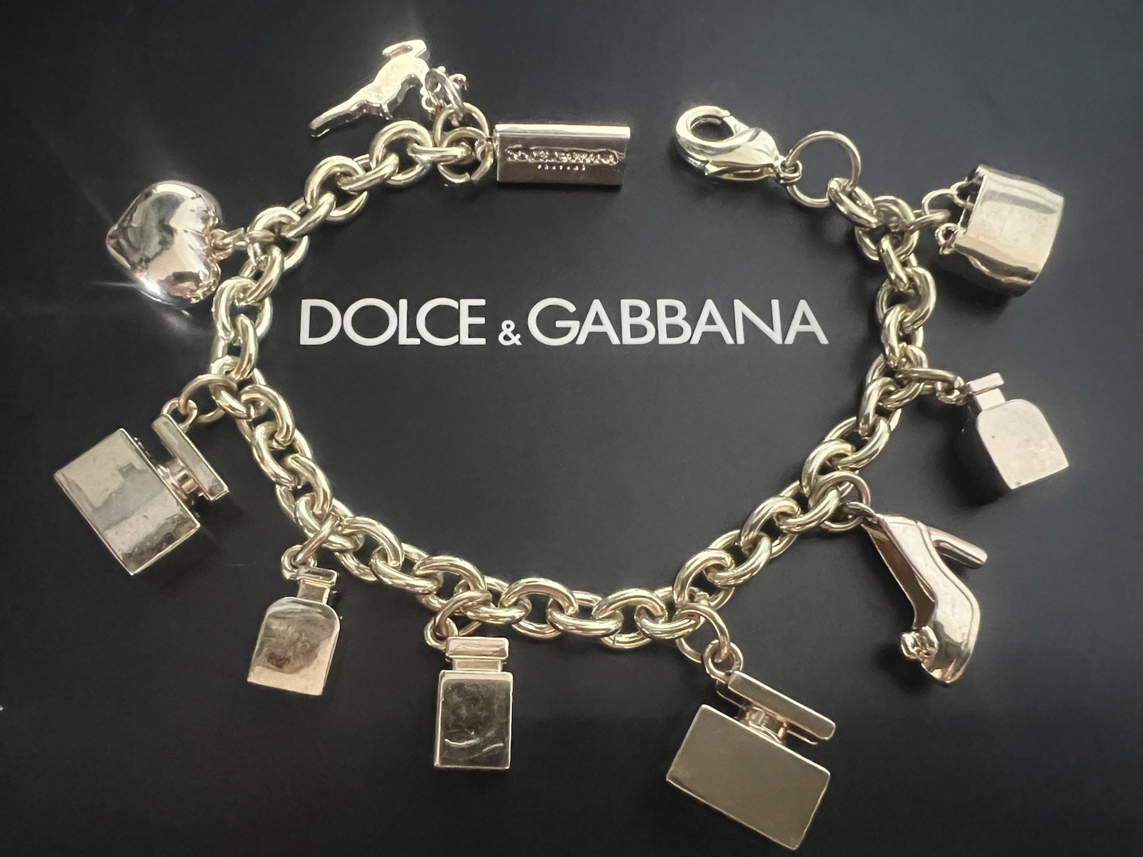 🔴 DOLCE & GABBANA bracciale charm gioiello acciaio dorato con pendenti iconici
