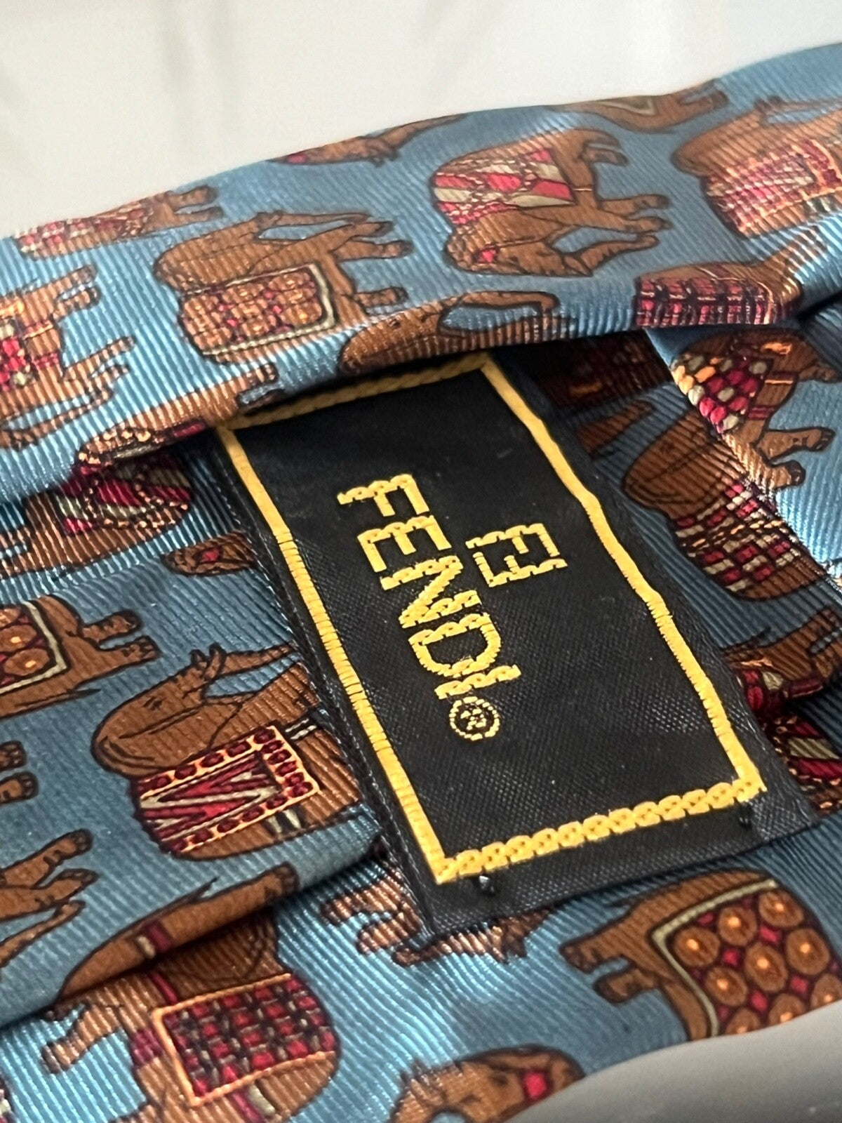 🔴 FENDI cravatta uomo SETA AZZURRA con ELEFANTI classica italiana busta