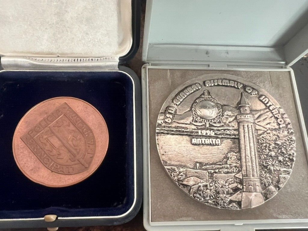 Medals Police International And Cardboard Marble IN Cases Stock 2
