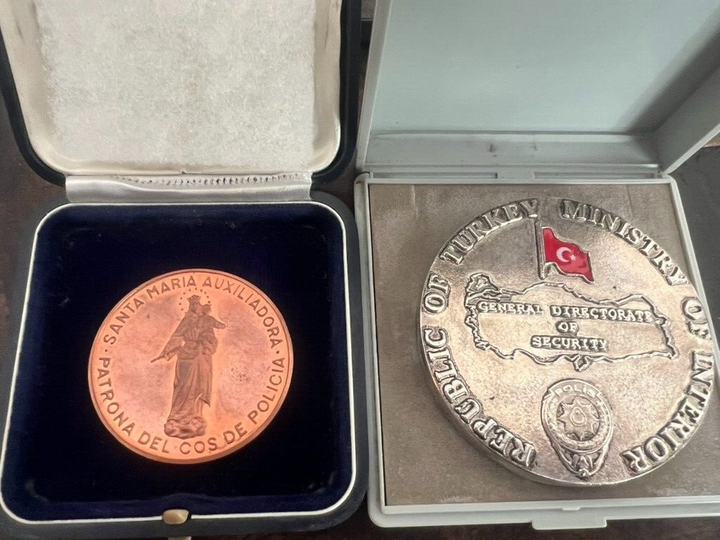 Medals Police International And Cardboard Marble IN Cases Stock 2