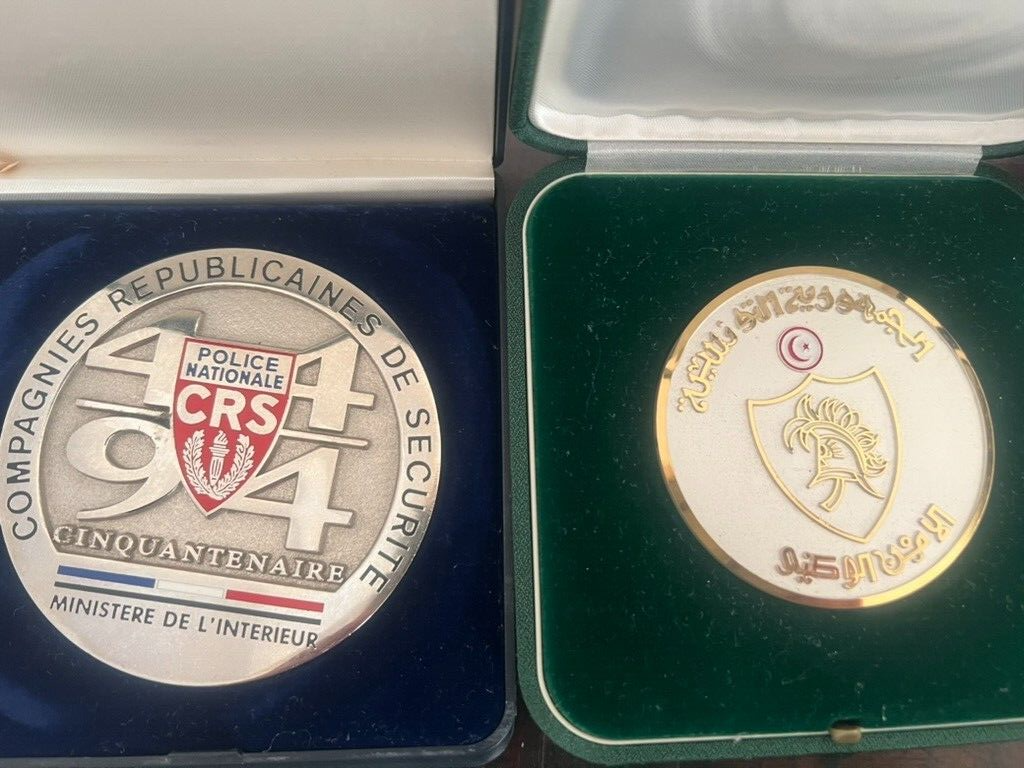Medals Police International And Cardboard Marble IN Cases Stock 2