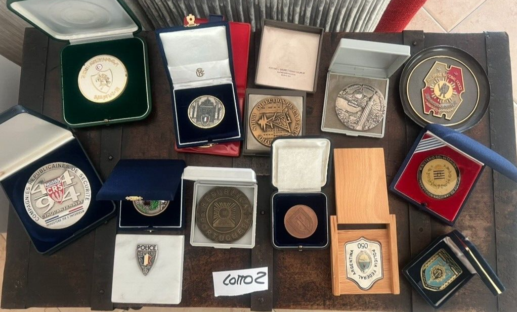 Medals Police International And Cardboard Marble IN Cases Stock 2