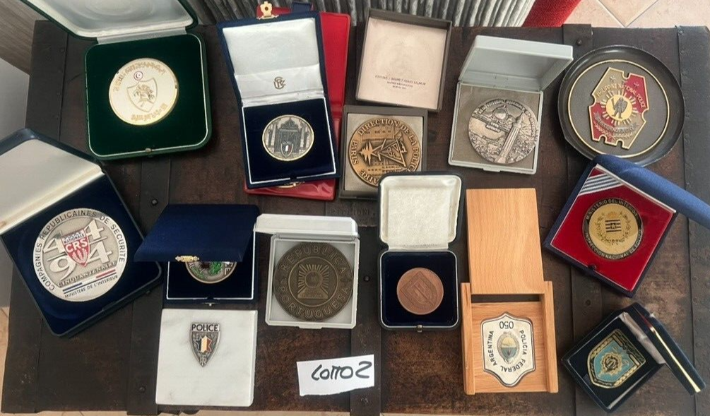 Medals Police International And Cardboard Marble IN Cases Stock 2
