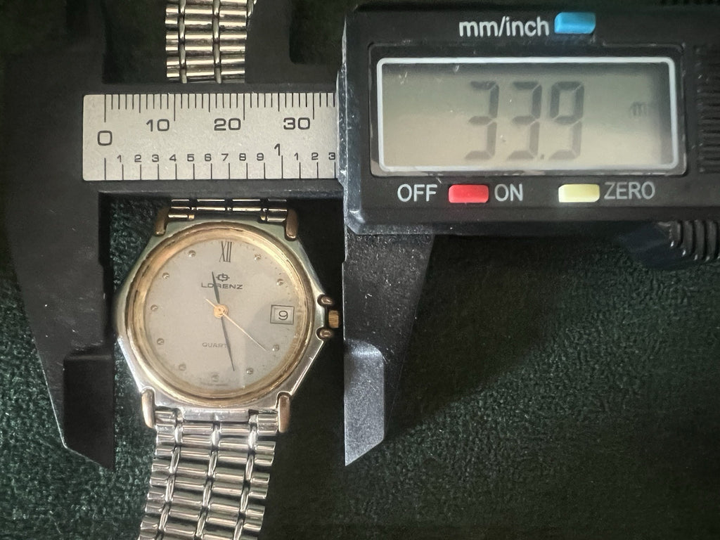 🔴 LORENZ orologio uomo al quarzo acciaio e laminato funziona vintage